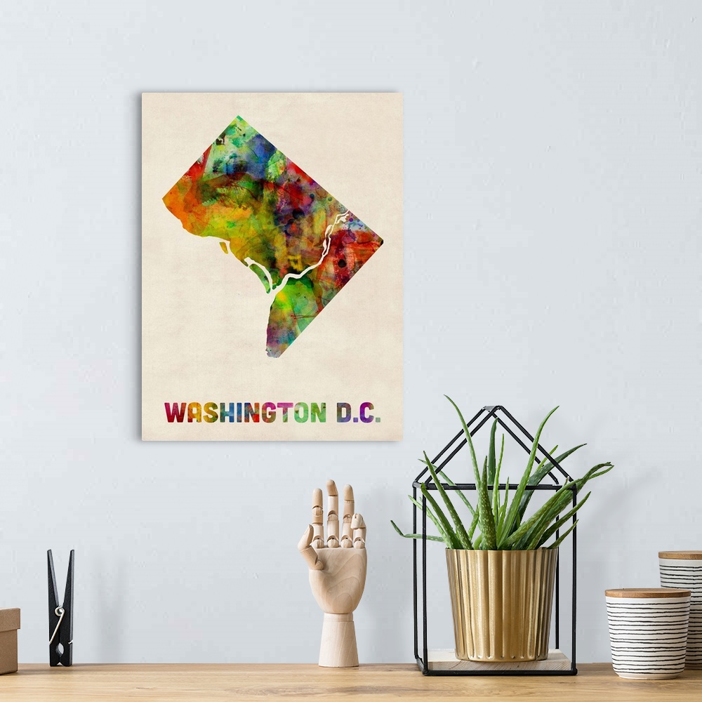 A bohemian room featuring Contemporary piece of artwork of a map of Washington DC made up of watercolor splashes.