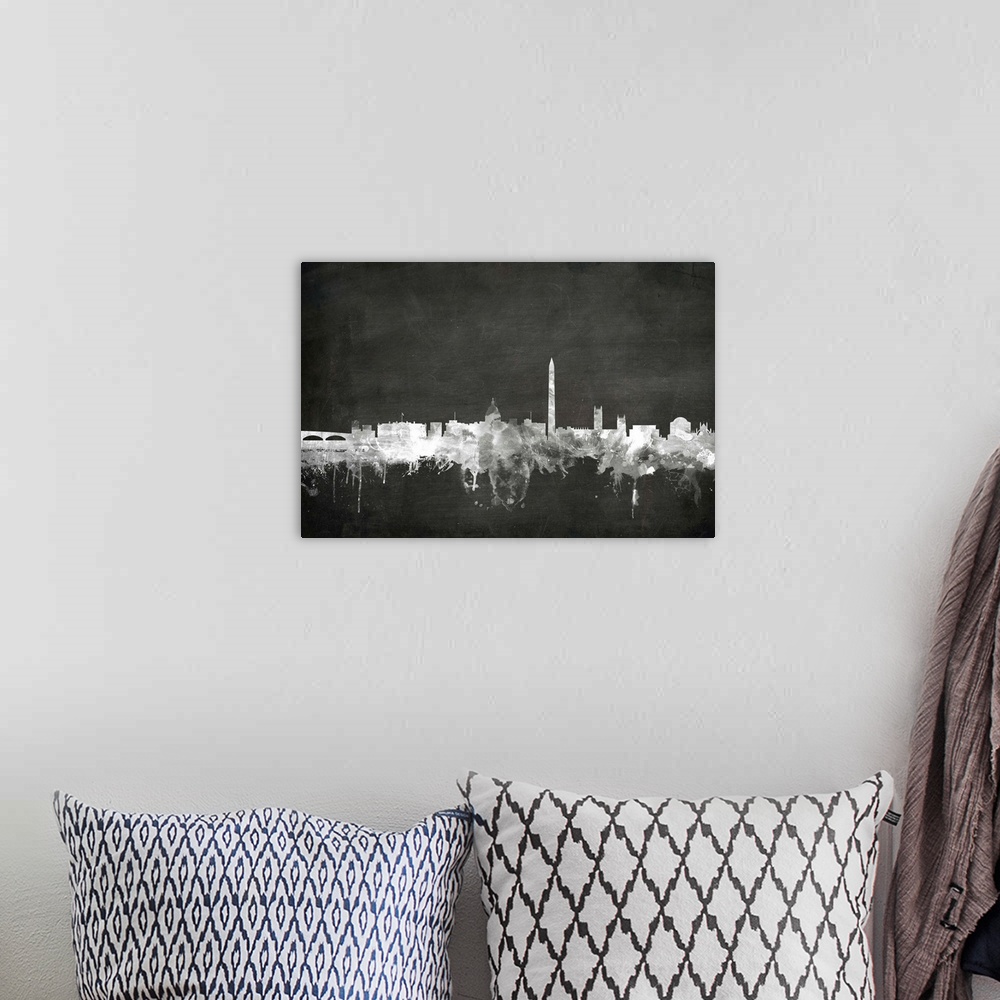 A bohemian room featuring Smokey dark watercolor silhouette of the Washington DCcity skyline against chalkboard background.