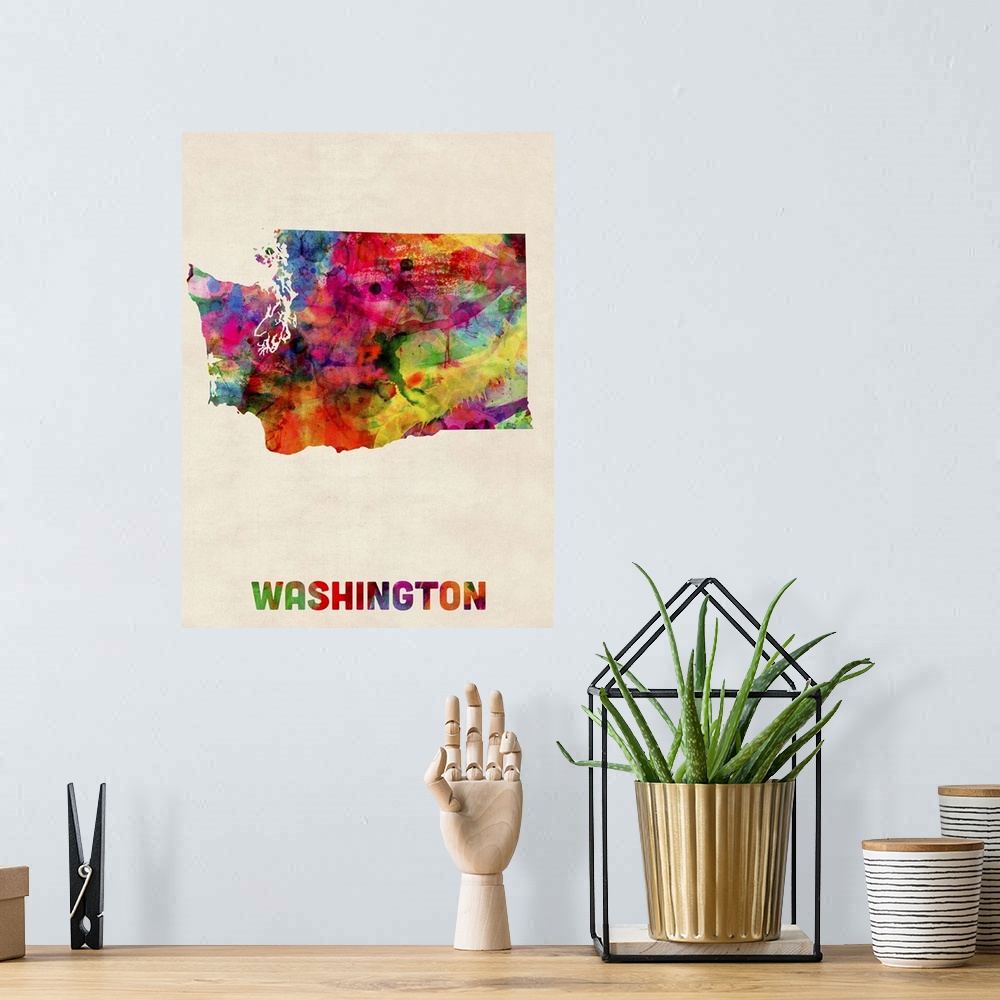 A bohemian room featuring Contemporary piece of artwork of a map of Washington made up of watercolor splashes.