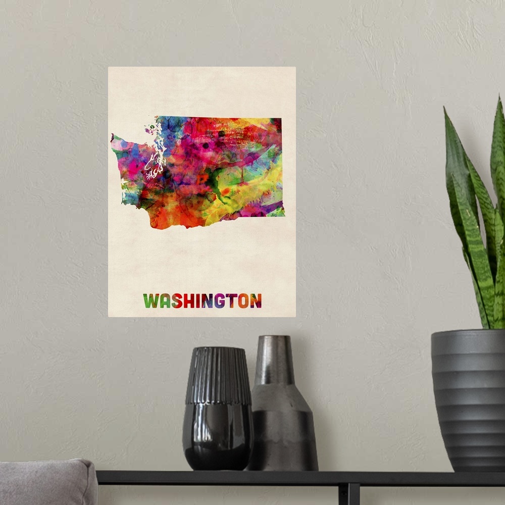 A modern room featuring Contemporary piece of artwork of a map of Washington made up of watercolor splashes.