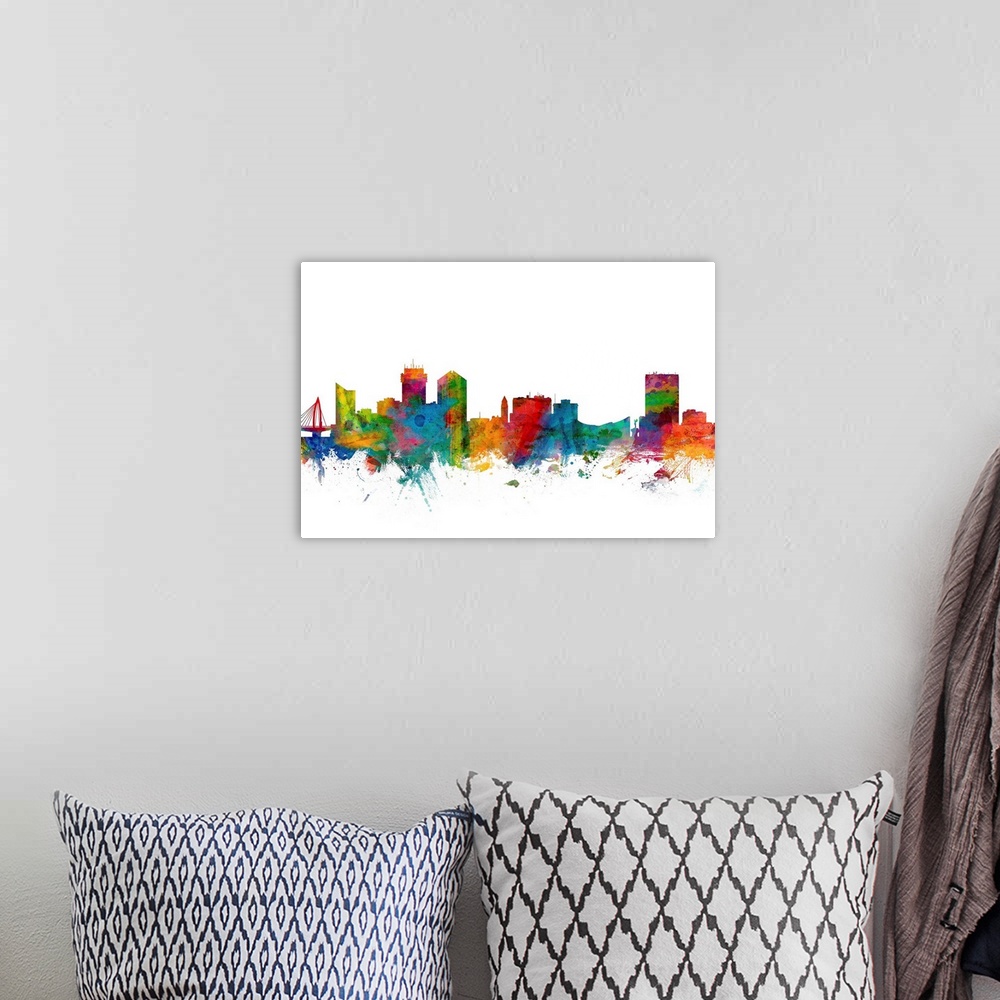 A bohemian room featuring Watercolor artwork of the Wichita skyline against a white background.