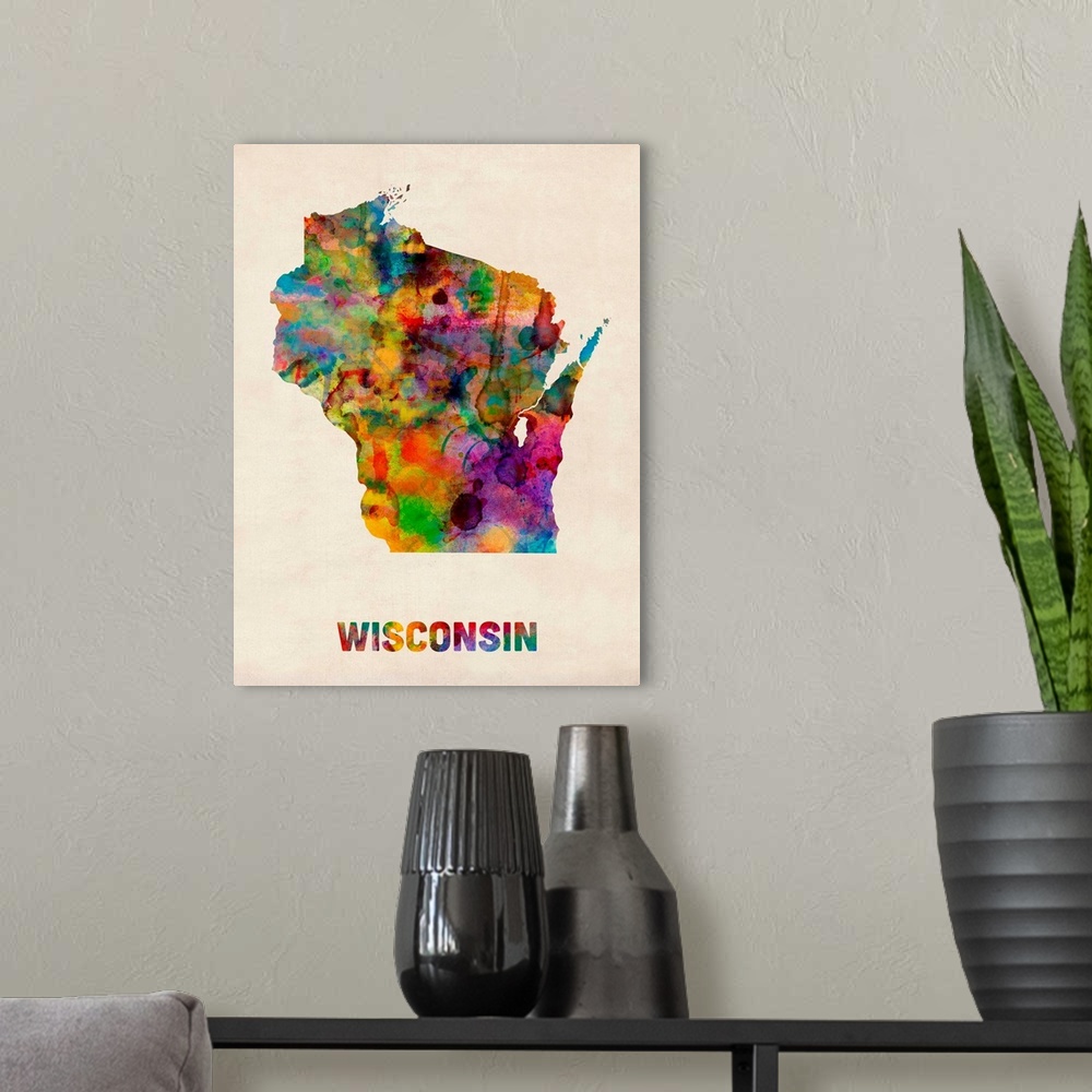 A modern room featuring Contemporary piece of artwork of a map of Wisconsin made up of watercolor splashes.