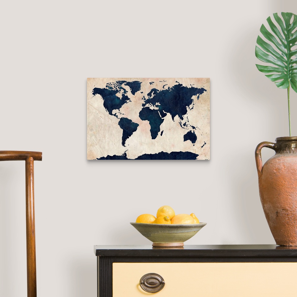 A traditional room featuring Big canvas art of distressed stenciled map of the world with the continents silhouetted.