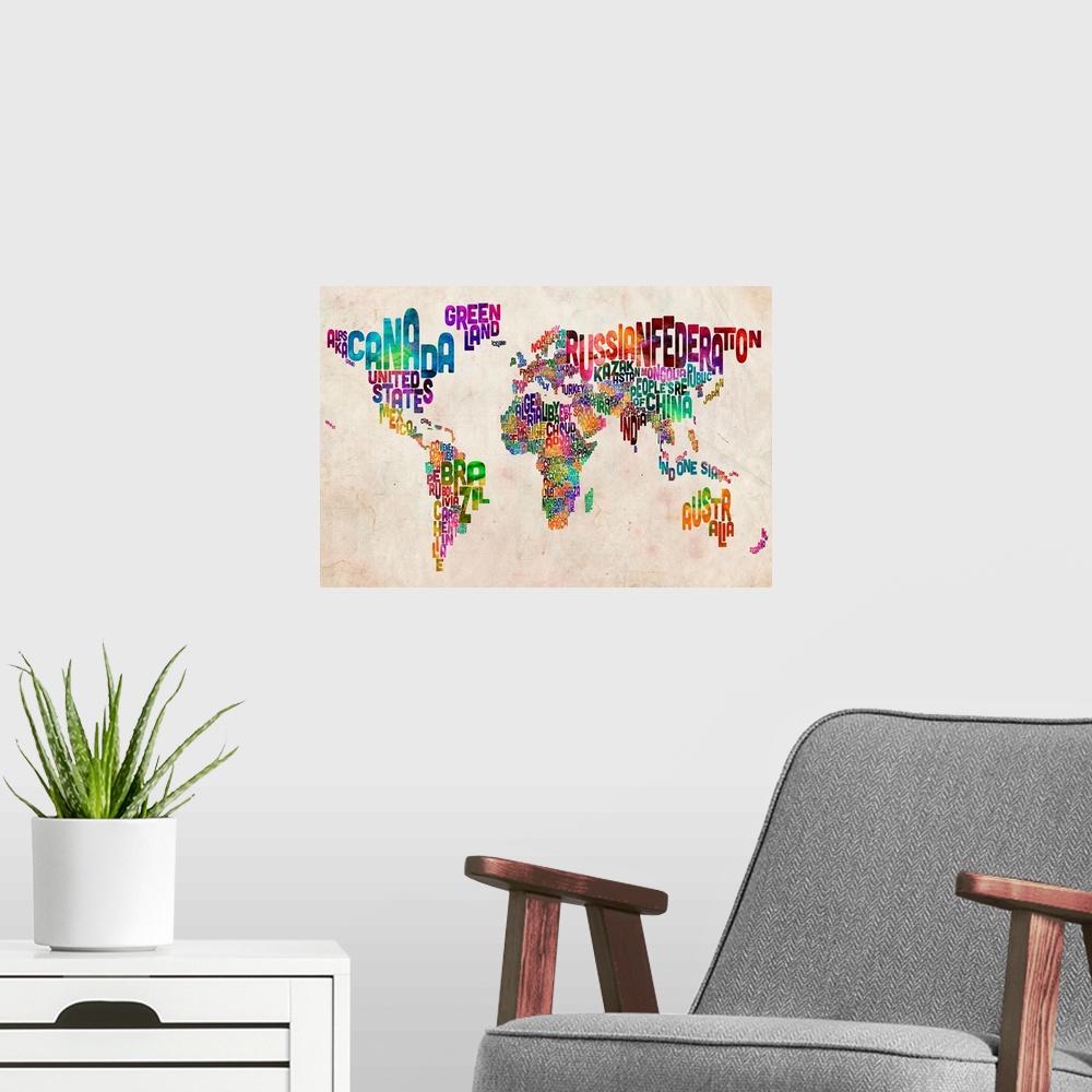 A modern room featuring Typographic art work of the names of the countries of the world made up of the letters that spell...
