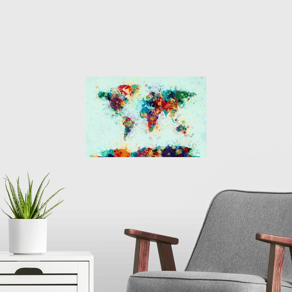A modern room featuring Contemporary world map artwork made of bright watercolor paint splashes.