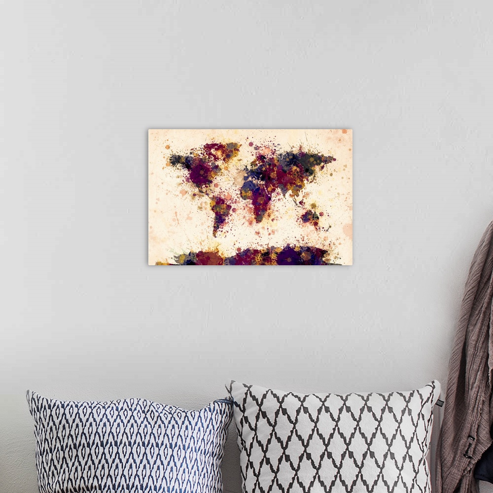 A bohemian room featuring Contemporary world map artwork made of dark watercolor paint splashes.