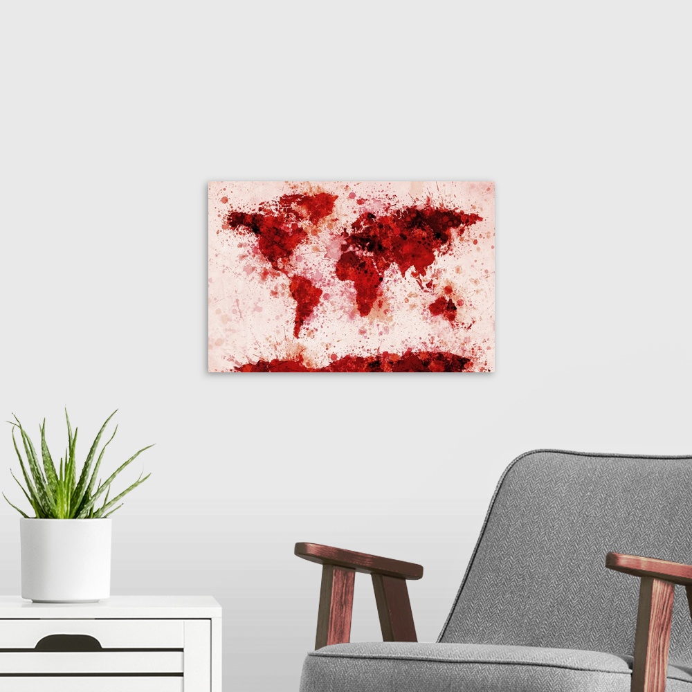 A modern room featuring Oversized, horizontal art of a map of the world made from colored paint splashes.