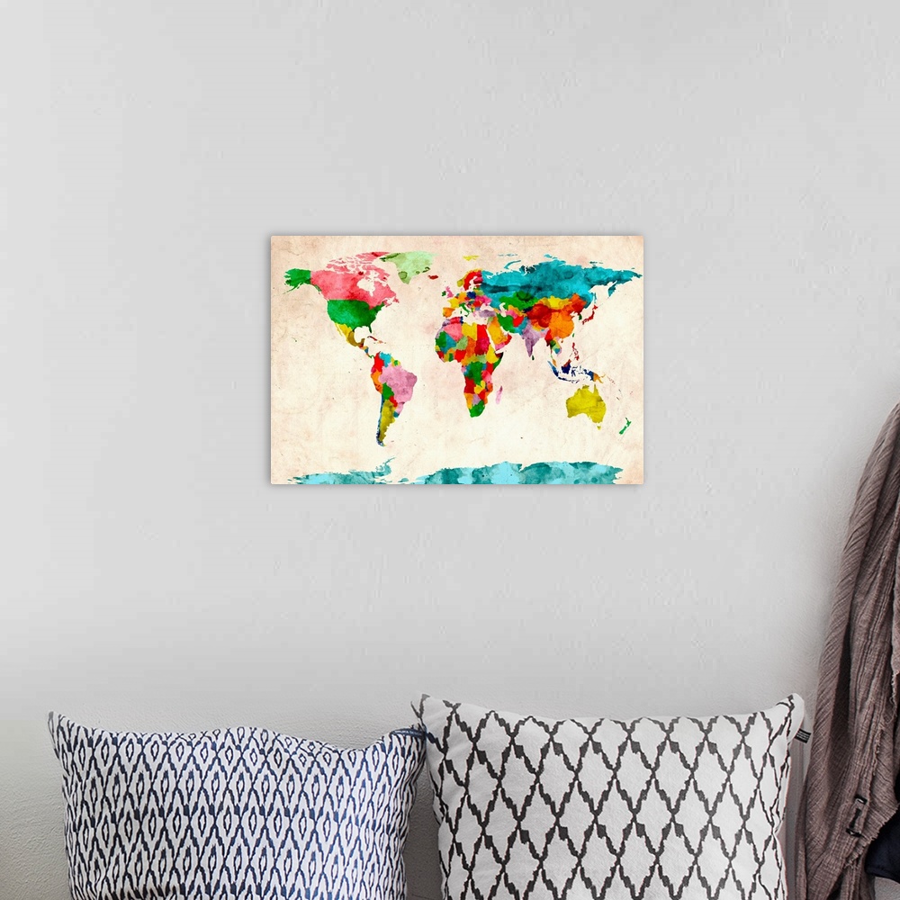 A bohemian room featuring Oversized wall art created using water based paint textures to outline countries on political map...