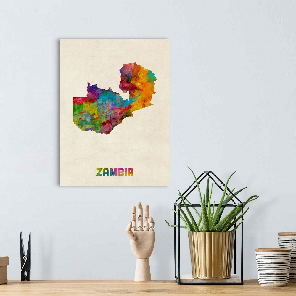 A bohemian room featuring A watercolor map of Zambia.