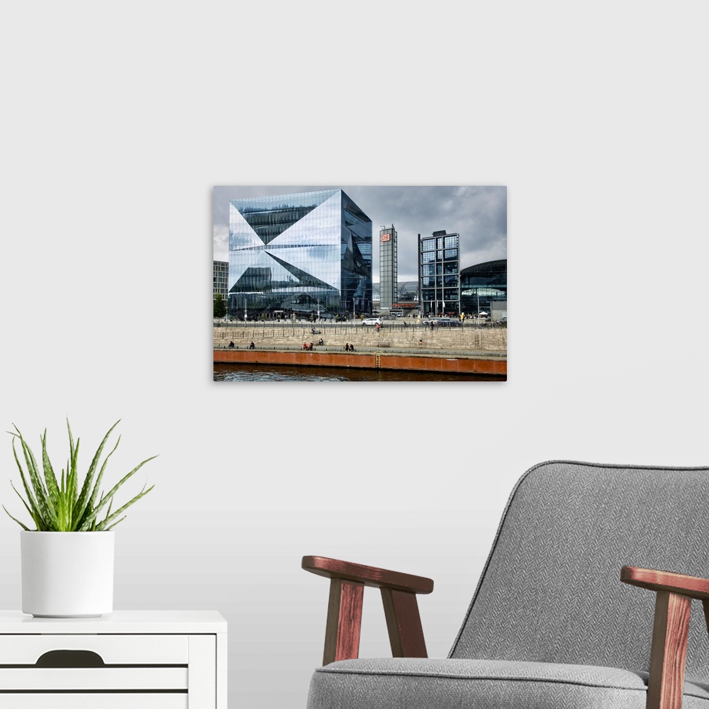 A modern room featuring Germany, Berlin. Looking at Central Station's buildings from across river Spree.
