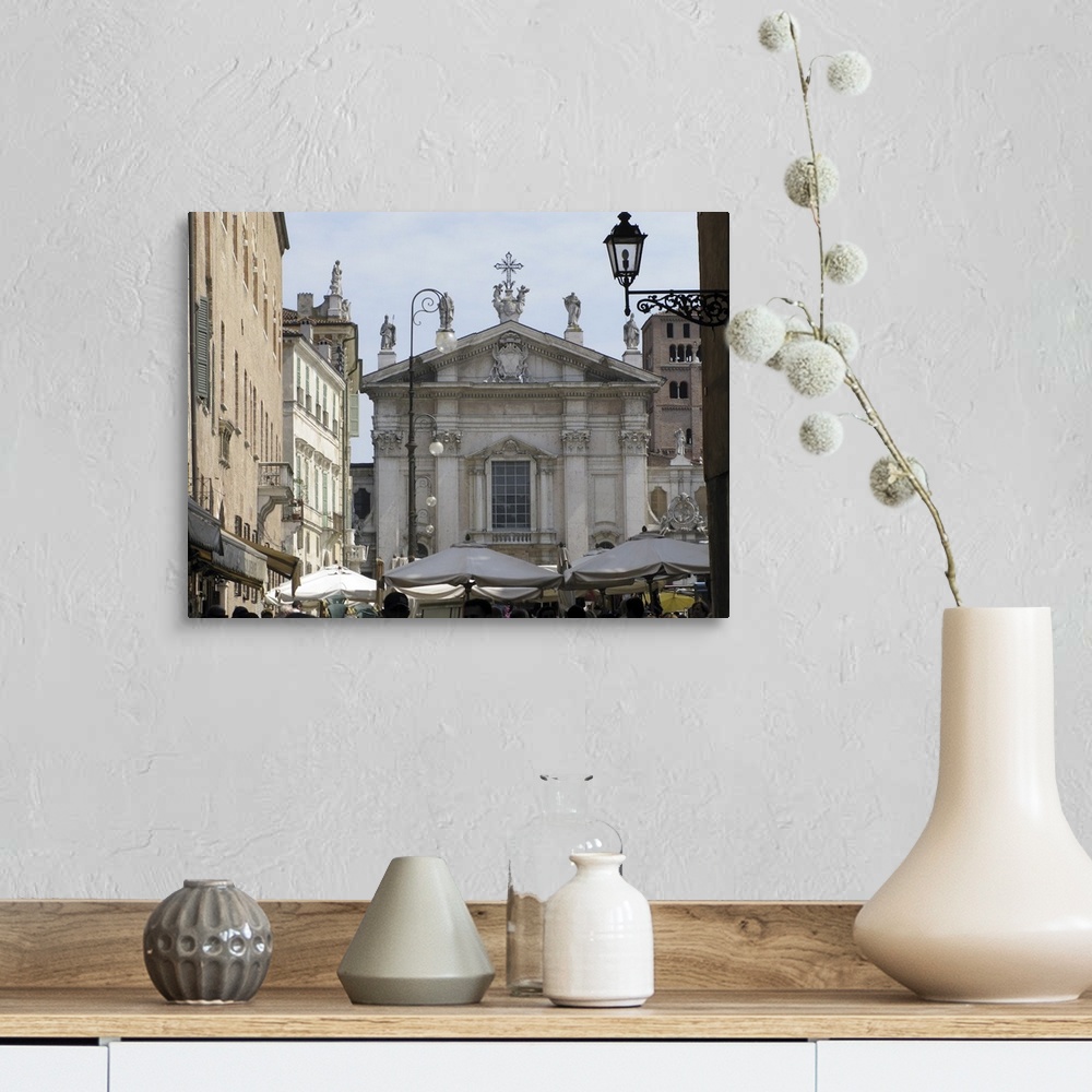 A farmhouse room featuring The Duomo of Mantua, Cathedral, faces Sordello Sq. 
Facade is Baroque made with Carrara marble.