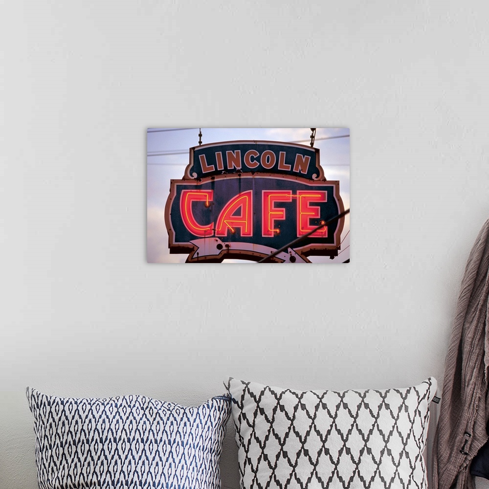 A bohemian room featuring Usa, Lincoln Cafe' neon sign