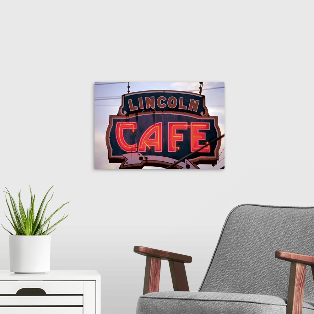 A modern room featuring Usa, Lincoln Cafe' neon sign