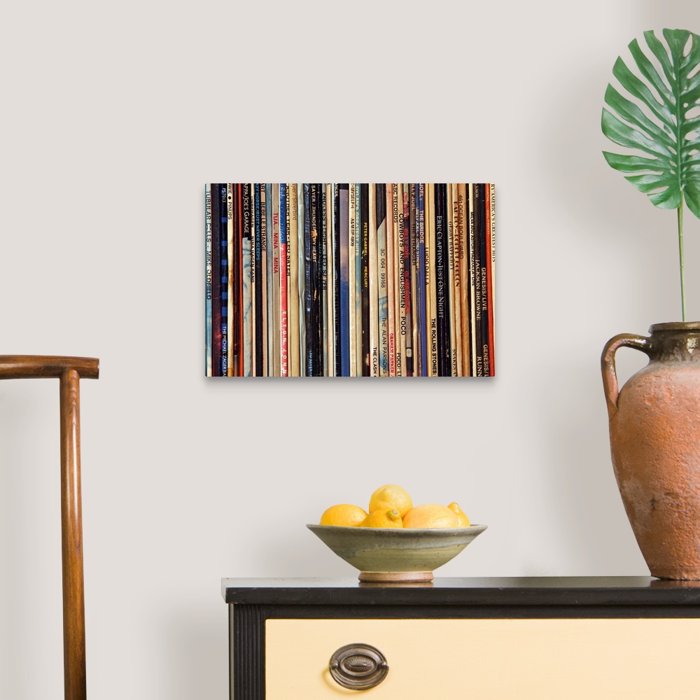 A traditional room featuring Big photograph shows a large collection of LP vinyl records that includes works from artists such...