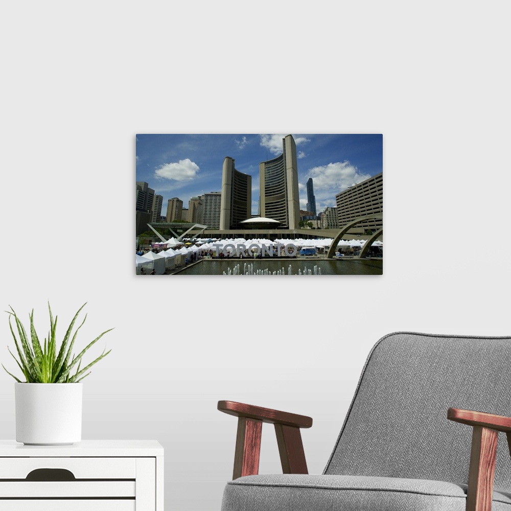 A modern room featuring Nathan Phillips Sq., Toronto, Ontario, Canada.