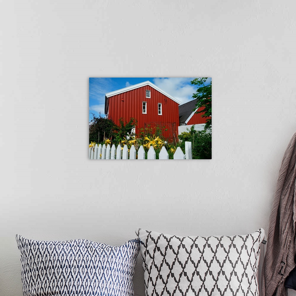 A bohemian room featuring Norway, Skudeneshavn: red house and white fence