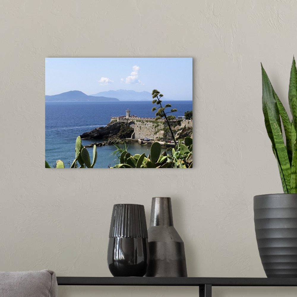 A modern room featuring Piombino, Tuscany coast in Summer time; Tyrrhenian sea. Ferry boat passing by, connecting mainlan...