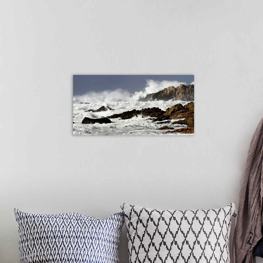 A bohemian room featuring A powerful wave explodes over Bird Rock in Pebble Beach. Coastal birds and sea lions that often r...