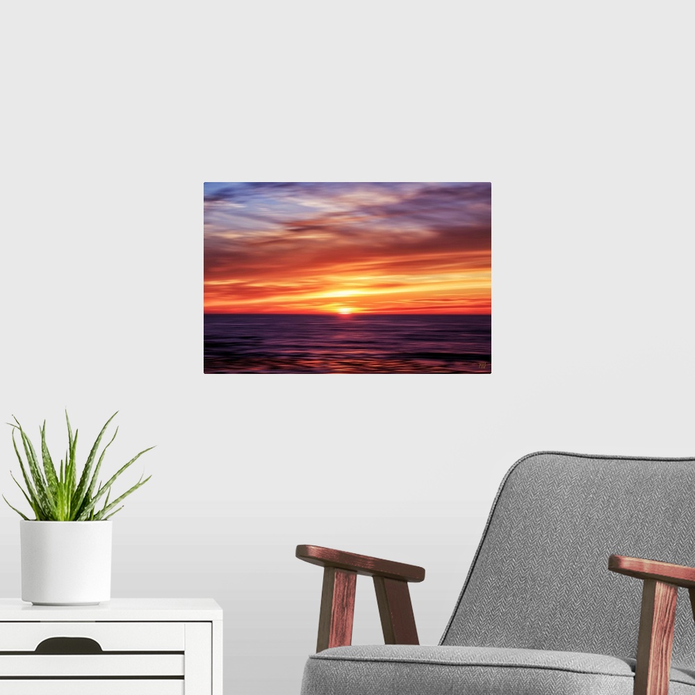 A modern room featuring A spectacular ocean sunset in Carmel, California. Michael Lynberg's stunning works of photo-impre...