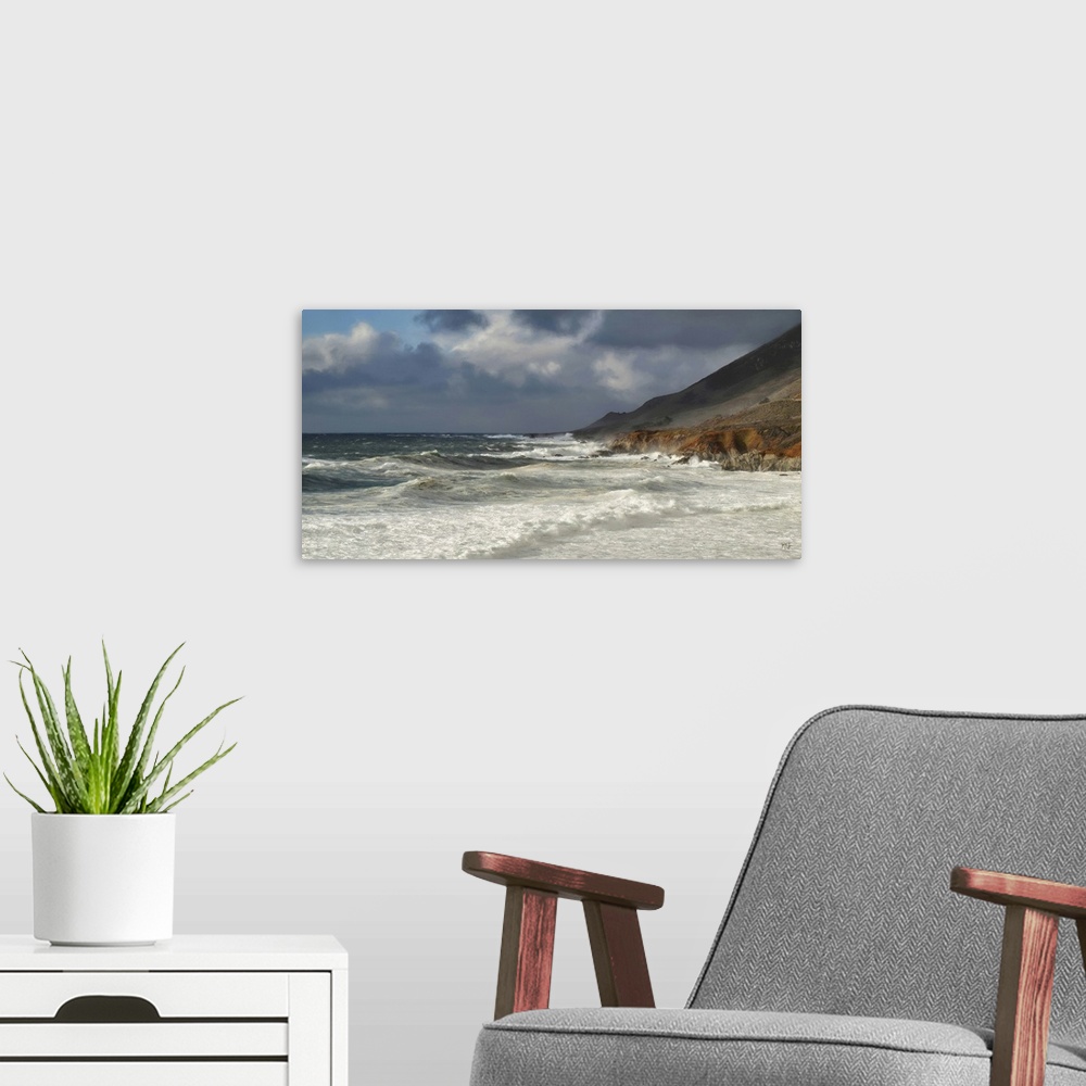 A modern room featuring Winter waves rush toward the shore at Garrapata Beach in Big Sur. The colors and tones of the oce...