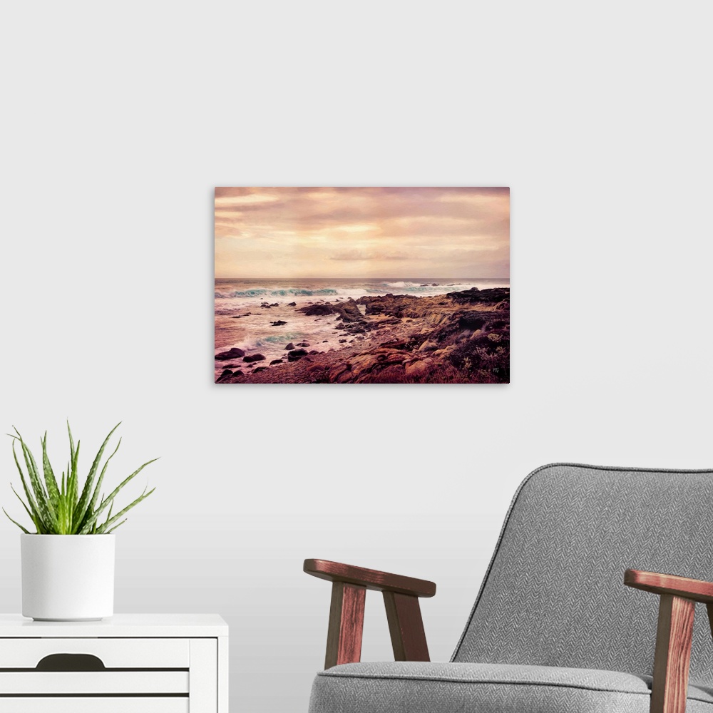 A modern room featuring The pink and mauve colors of a Pebble Beach sunset make the beautiful teals of breaking waves esp...