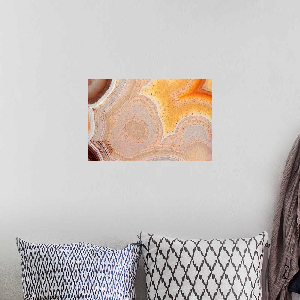 A bohemian room featuring This macro photograph creates an abstract scene by showing slices of rocks up close.
