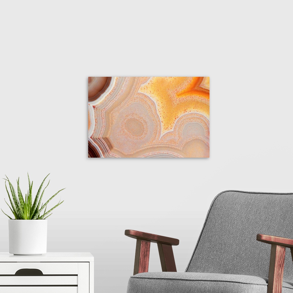 A modern room featuring This macro photograph creates an abstract scene by showing slices of rocks up close.