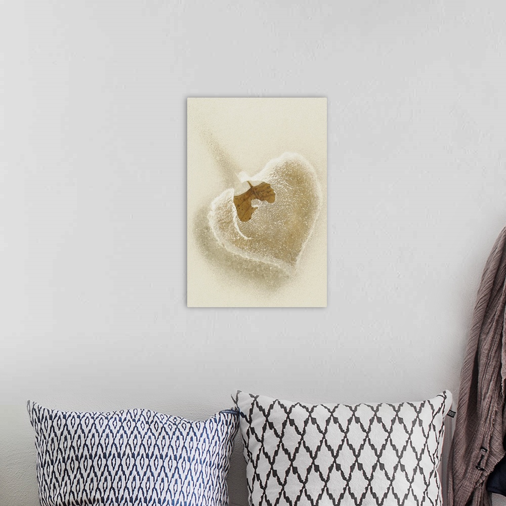 A bohemian room featuring This vertical wall hanging is a close up photograph of a leaf trapped in frozen water.