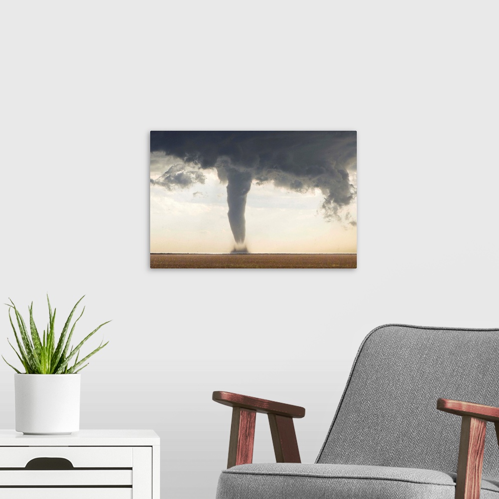 A modern room featuring A classic spring tornado from a supercell thunderstorm, with hail.