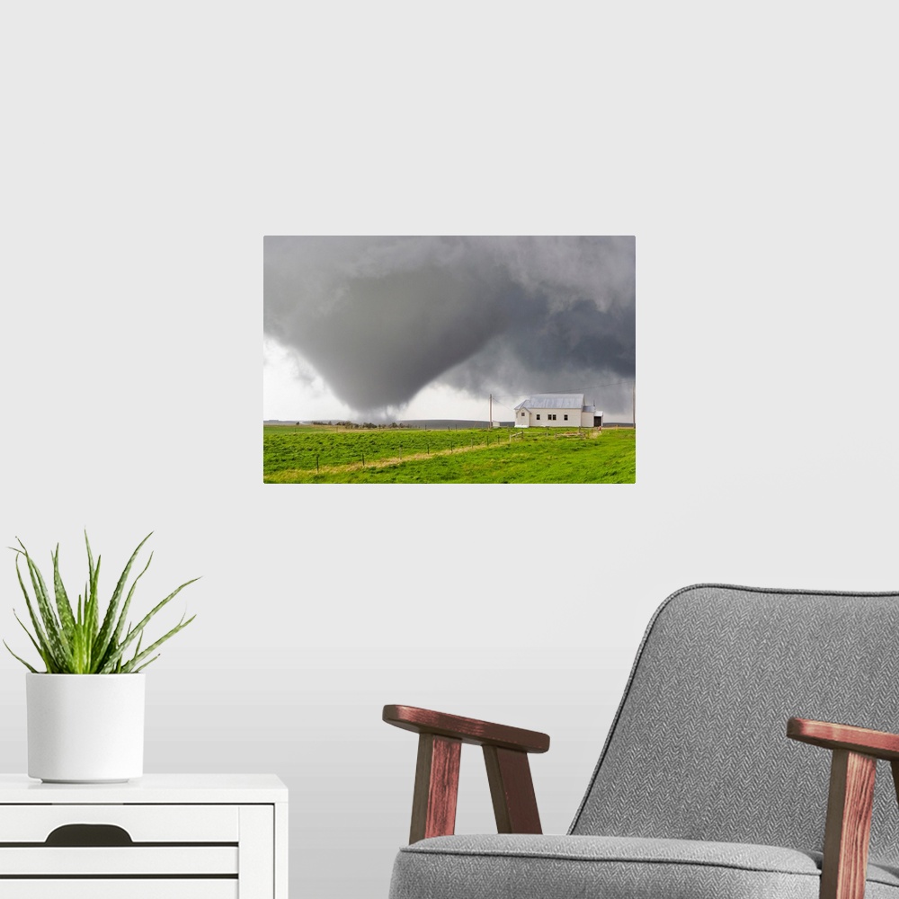 A modern room featuring A powerful tornado approaches a church and just misses hitting it.