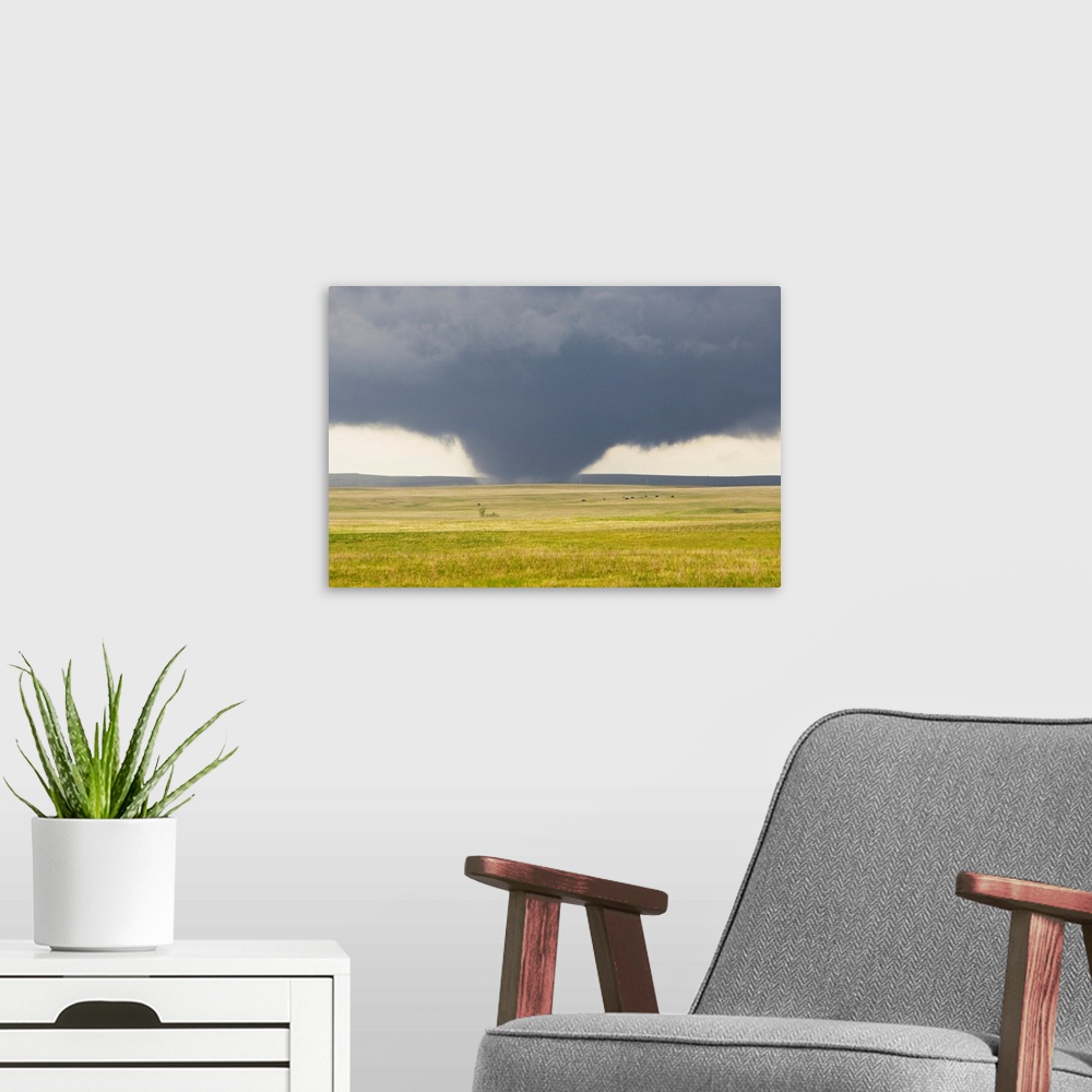 A modern room featuring A powerful tornado rips through the South Dakota countryside.