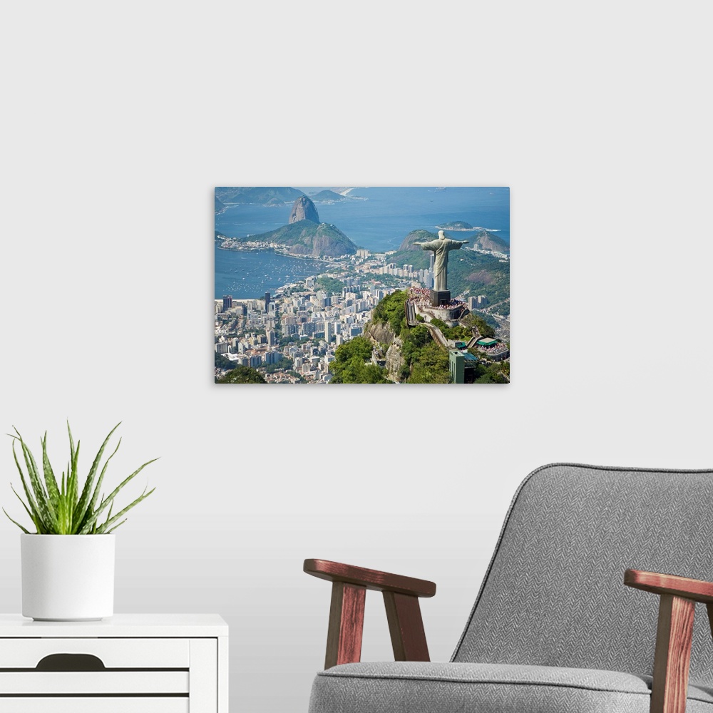 A modern room featuring Aerial of the Christ the Redeemer statue overlooking Rio de Janeiro.