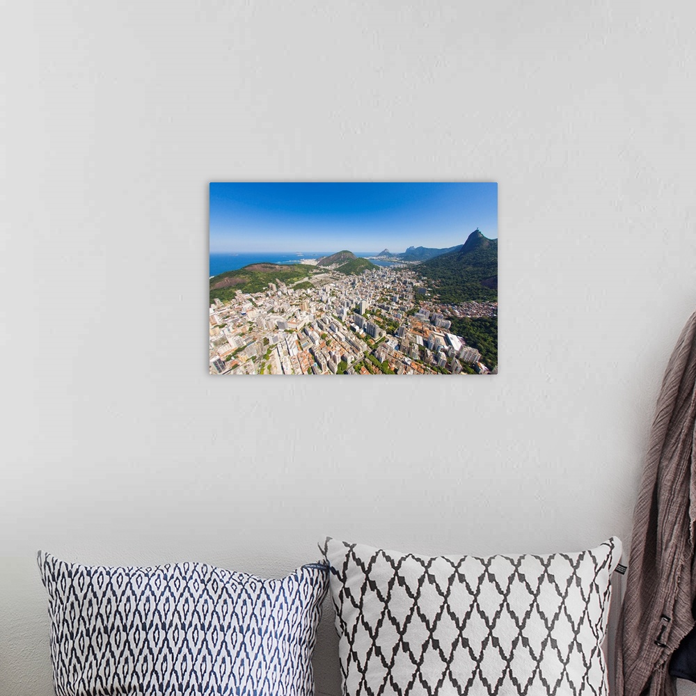 A bohemian room featuring Aerial view of Christ the Redeemer statue overlooking the city of Rio de Janeiro, Brazil.