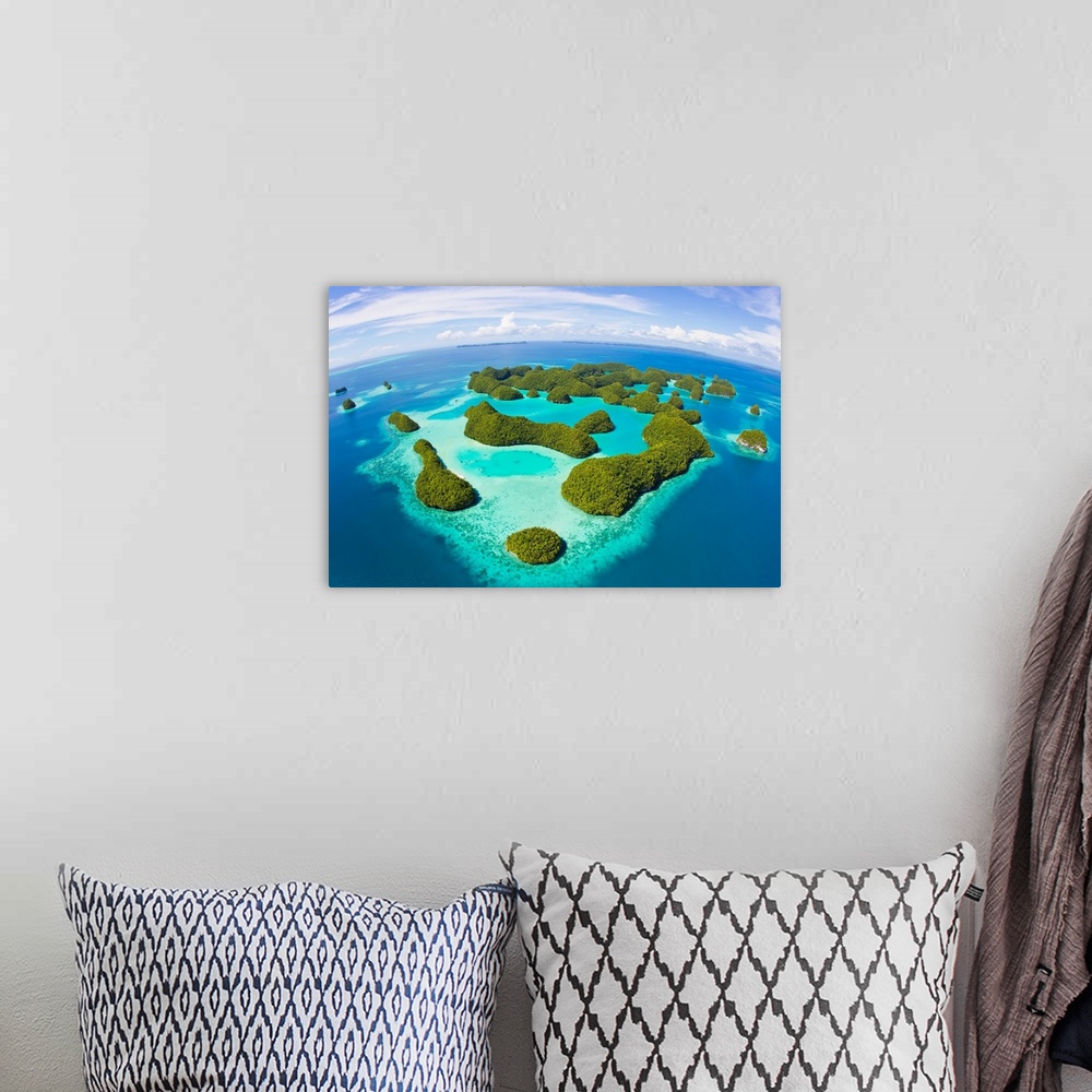 A bohemian room featuring An aerial fisheye lens view of Palau's Rock Islands in the turquoise waters of the Pacific Ocean.