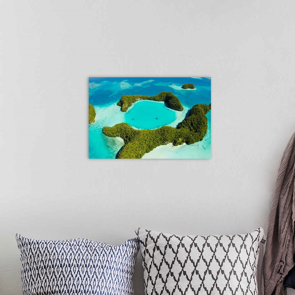 A bohemian room featuring An aerial view of Palau's Rock Islands in the turquoise waters of the Pacific Ocean.