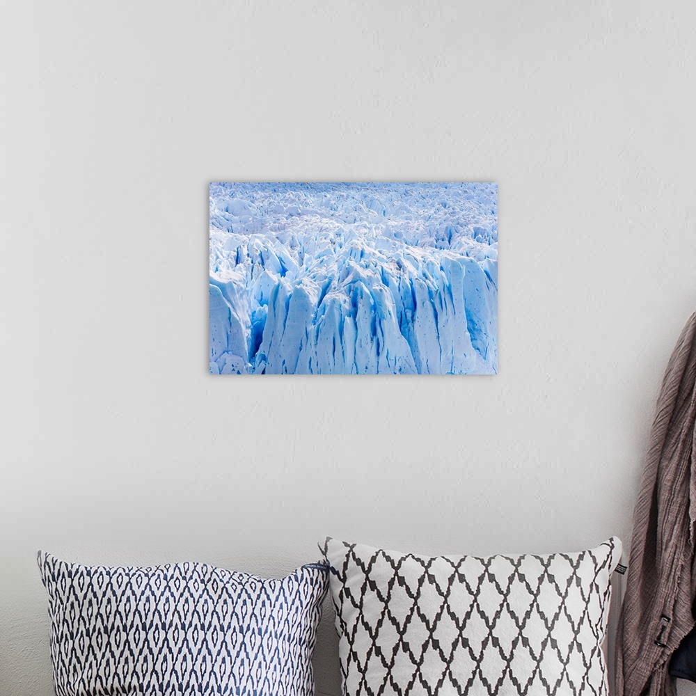 A bohemian room featuring Deep blue cracks on the front wall of the Perito Moreno glacier in Los Glaciares National Park.