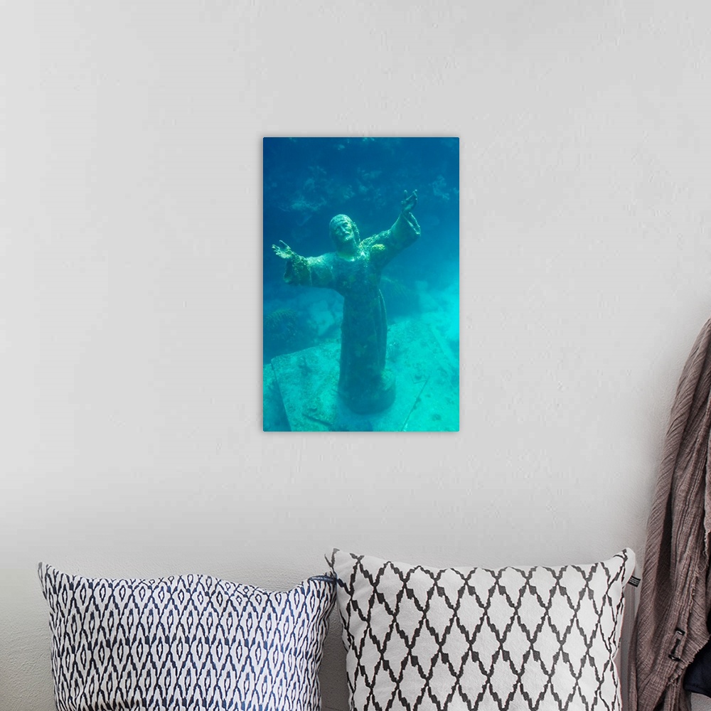 A bohemian room featuring Christ of the Deep statue in a coral reef state park in the Keys.