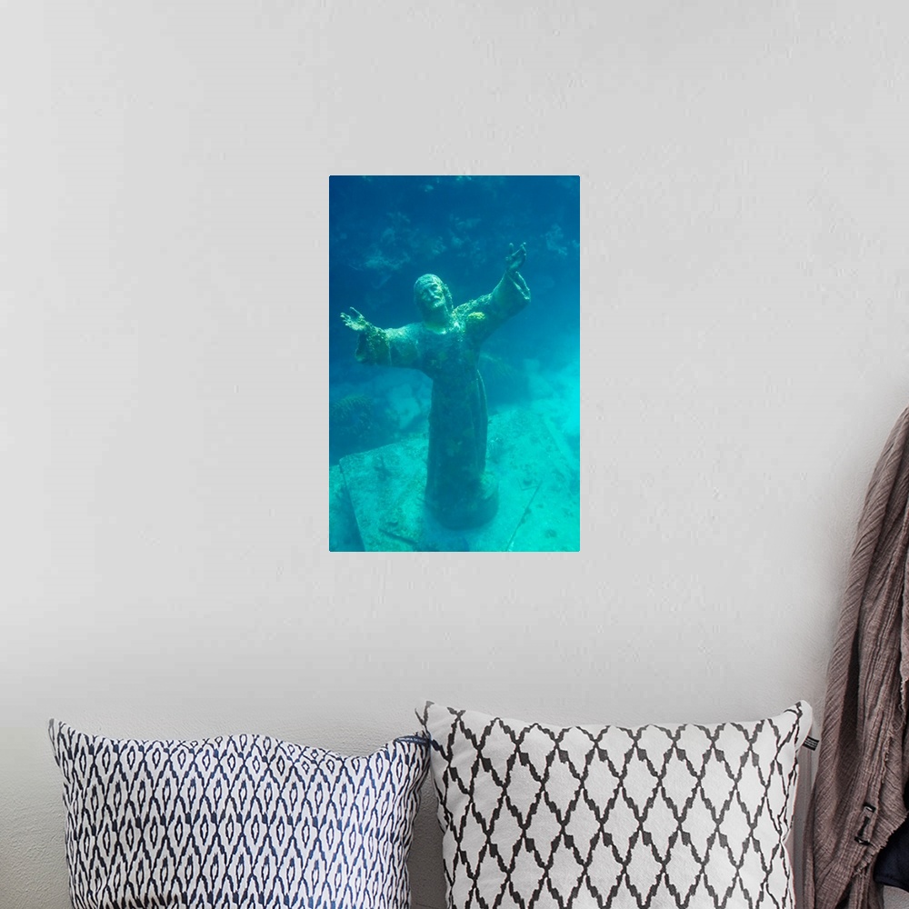 A bohemian room featuring Christ of the Deep statue in a coral reef state park in the Keys.