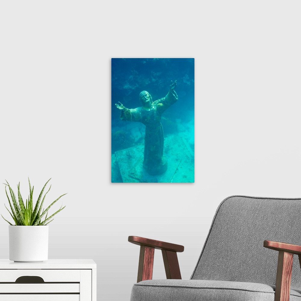 A modern room featuring Christ of the Deep statue in a coral reef state park in the Keys.