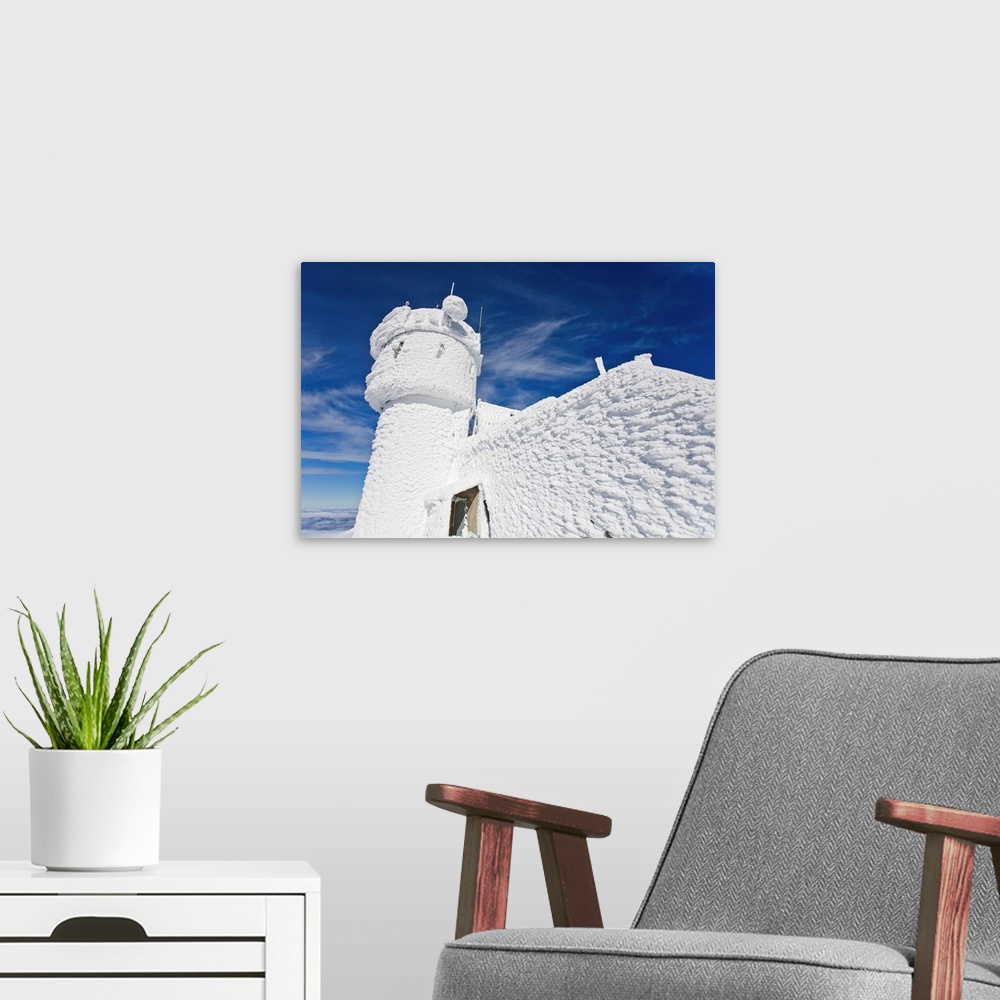 A modern room featuring Everything on the summit of Mt. Washington is covered in rime ice.