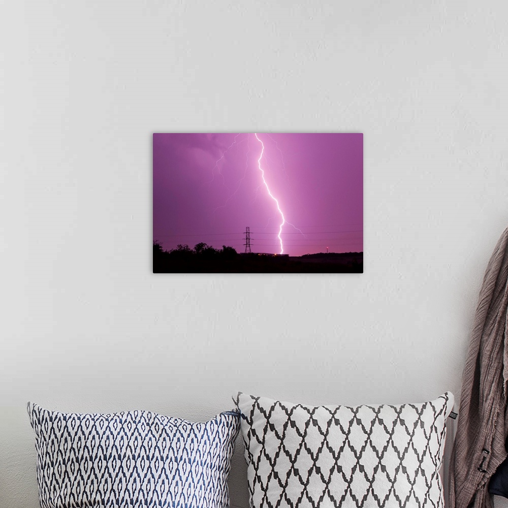 A bohemian room featuring Intense lightning bolt strikes in the city of Dallas during an active lightning storm in Texas.