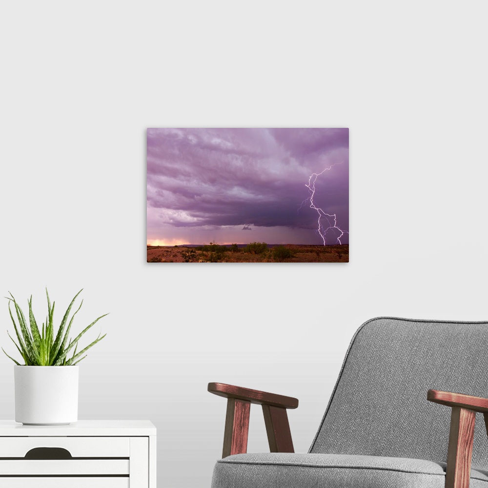A modern room featuring Intense purple lightning bolts strike in the desert of New Mexico.