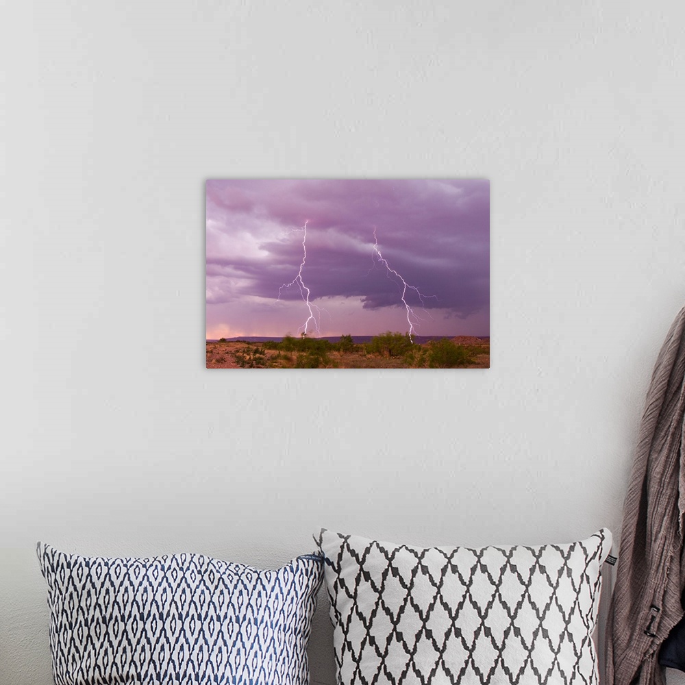 A bohemian room featuring Intense purple lightning bolts strike in the desert of New Mexico.