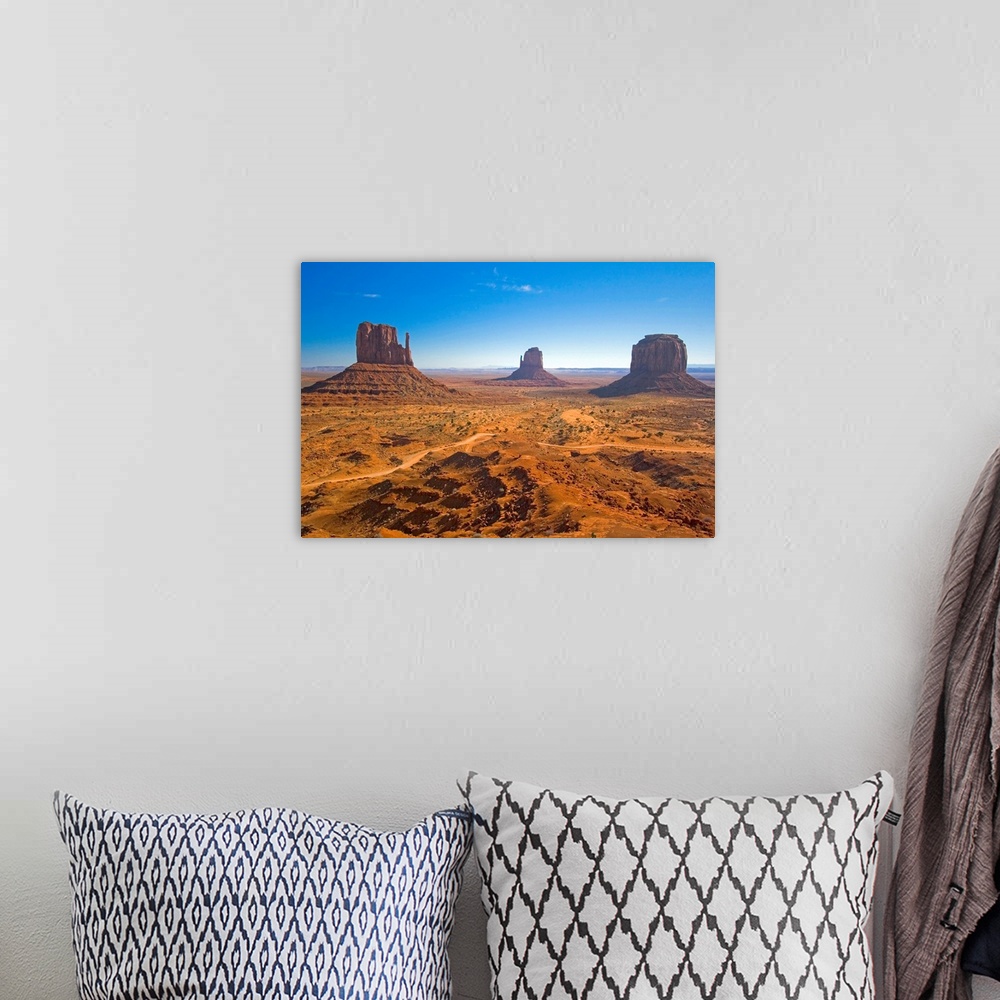 A bohemian room featuring Horizontal photograph from the National Geographic Collection of the vast, sandy landscape of Mon...