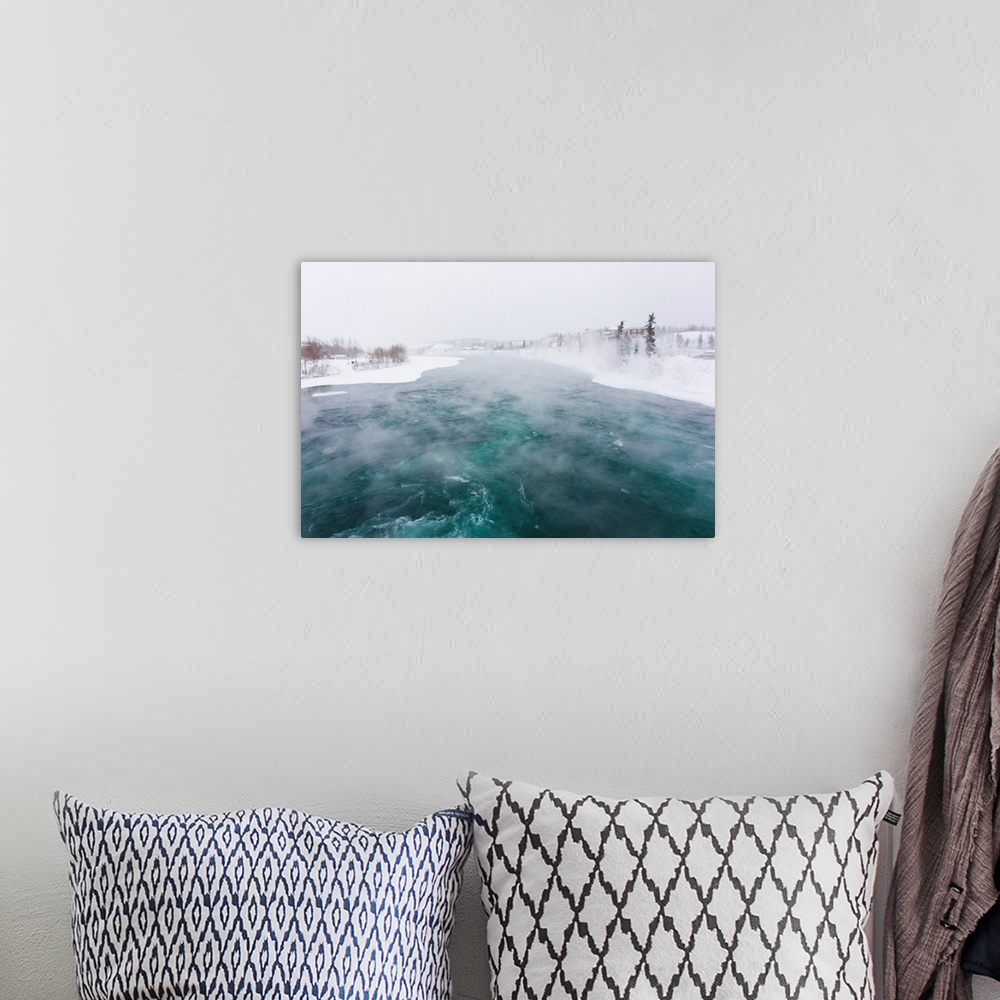 A bohemian room featuring Steam rising from the Yukon River in subzero temperatures.
