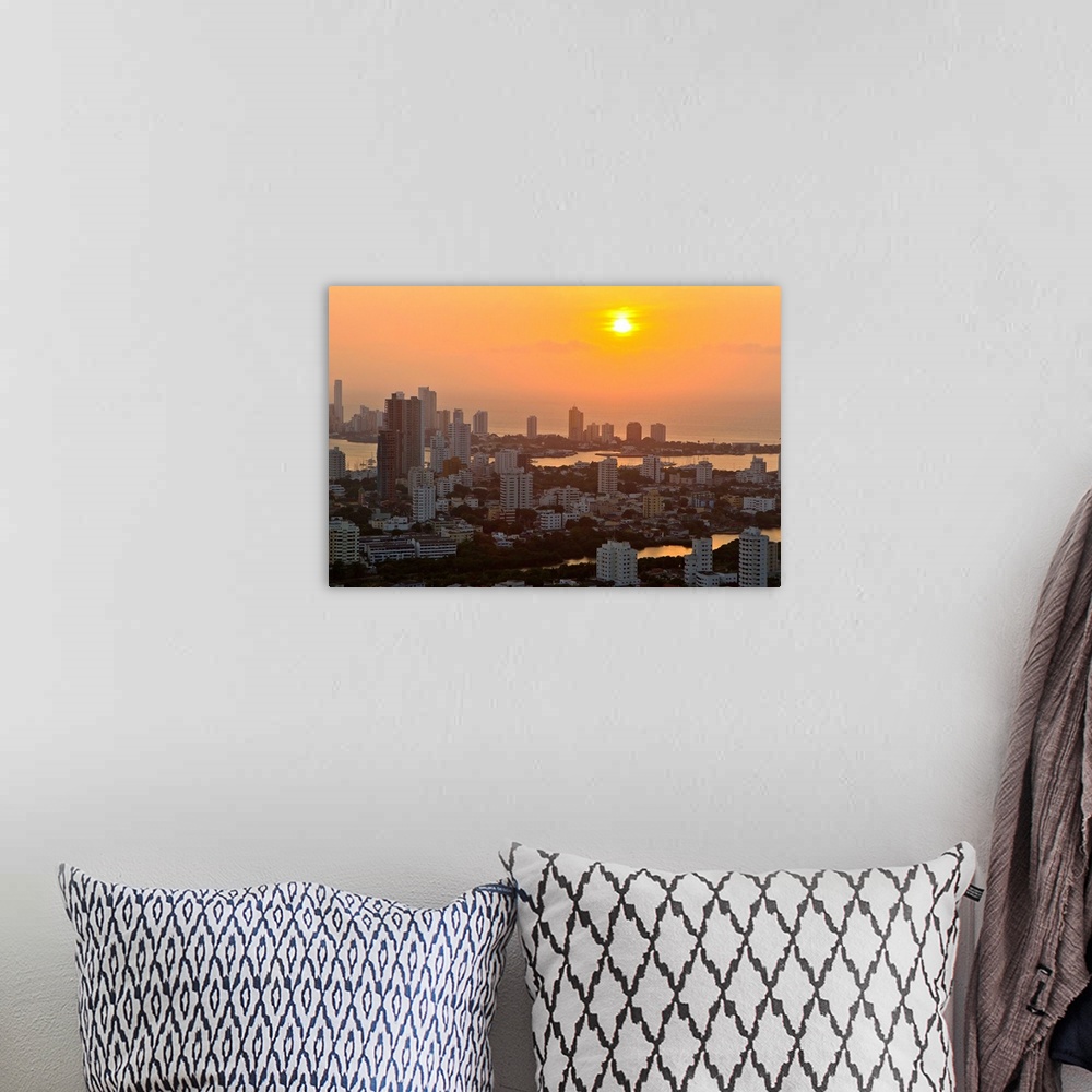 A bohemian room featuring Sunset over the city of Cartagena, Colombia.