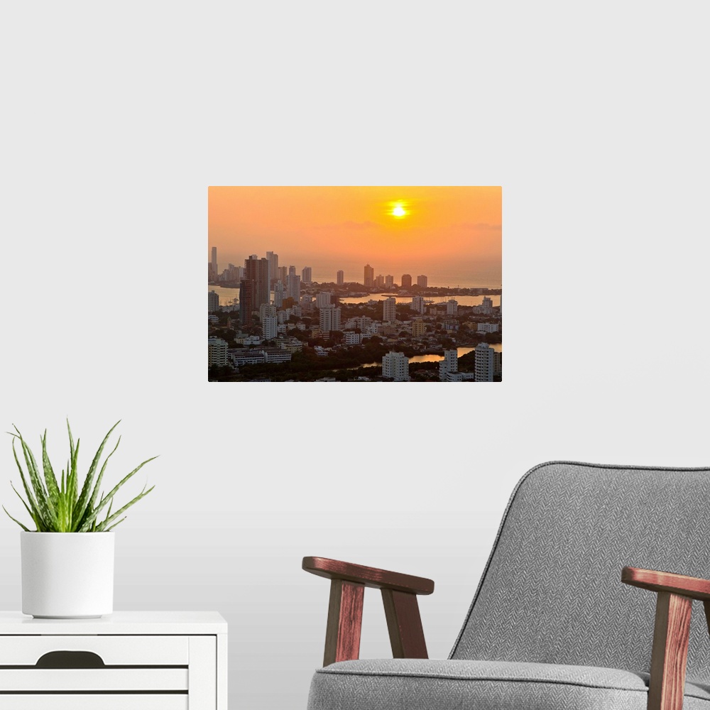 A modern room featuring Sunset over the city of Cartagena, Colombia.