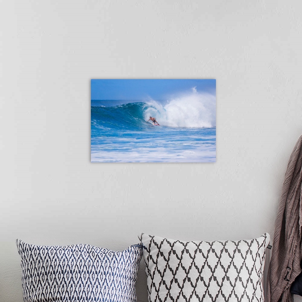 A bohemian room featuring Surfer riding the famous Banzai Pipeline, on Oahu's North Shore.