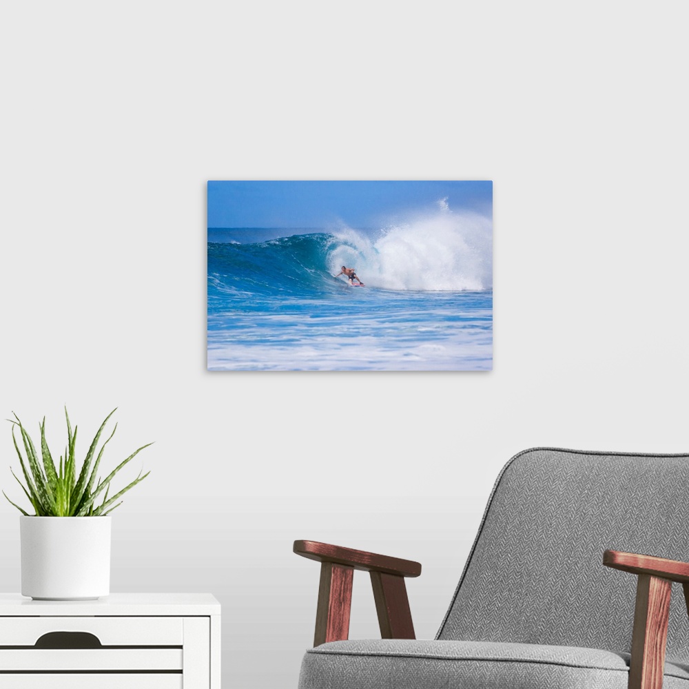 A modern room featuring Surfer riding the famous Banzai Pipeline, on Oahu's North Shore.