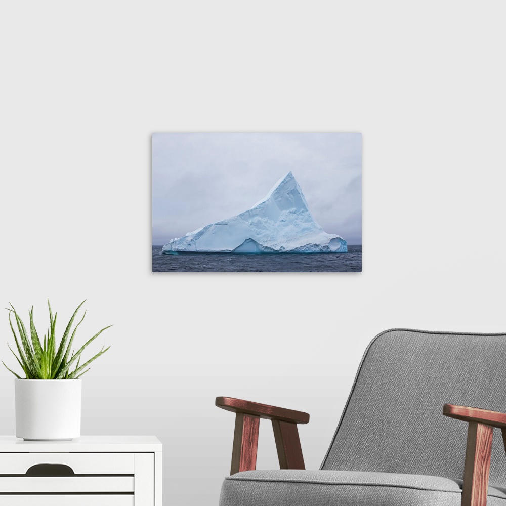 A modern room featuring Tabular iceberg with a point in Antarctica.